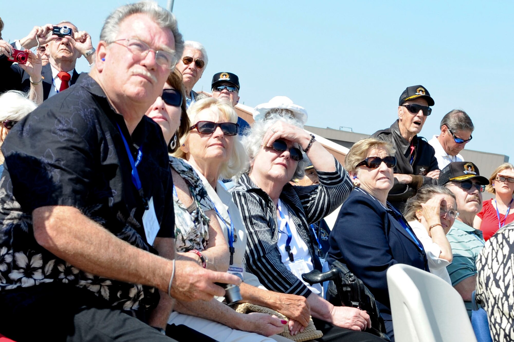 Members of the Legion of Valor watch an F-22 Raptor demo on the flight line at Langley Air Force Base, Va., as part of a base tour, May 31, 2012. Legion of Valor members have received either the Medal of Honor, Distinguished Service Cross, Navy Cross or the Air Force Cross during their service to the United States. (U.S. Air Force photo by Senior Airman Wesley Farnsworth/Released)