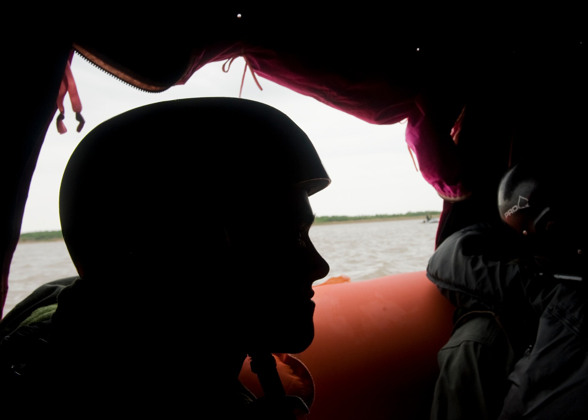 Airman 1st Class James Spangler, 39th Airlift Squadron, sits in a 20-man life raft he and several other airmen set up during water survival training May 9, 2012, at Lake Fort Phantom in Abilene, Texas. The water survival course refreshes airmen on events that might occur during an aircraft water landing. (U.S. Air Force photo by Airman 1st Class Peter Thompson/ Released)