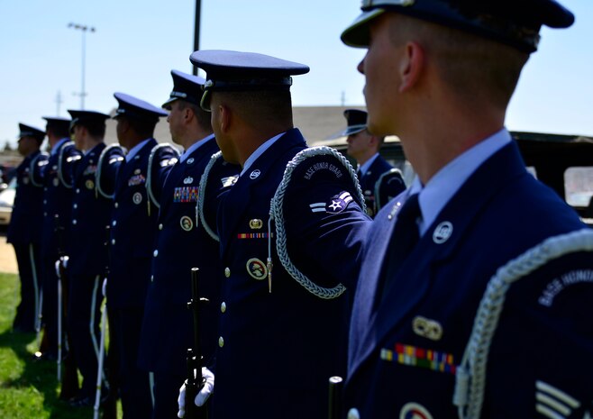Airmen from the Beale Base Honor Guard lineup to perform a 3-shot volley salute during a Memorial Day ceremony at the Calvary Christian Center, Yuba City, Calif., May 28, 2012. The ceremony was held to honor fallen warriors.  (U.S. Air Force photo by Airman1st Class Ayla Quellhorst/Released)