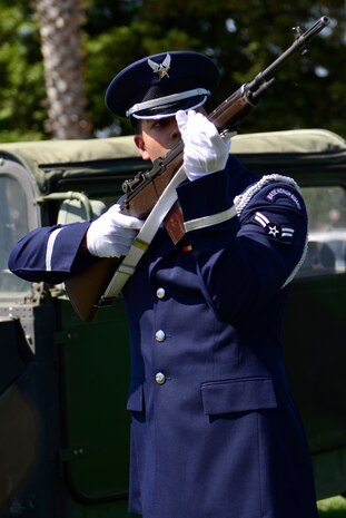 Airman 1st Class Jose Lopez takes part in a 3-shot volley salute during a Memorial Day ceremony at the Calvary Christian Center, Yuba City, Calif., May 28, 2012. The closing ceremony ends the week long service to honor fallen warriors. (U.S. Air Force photo by Airman1st Class Ayla Quellhorst/Released)