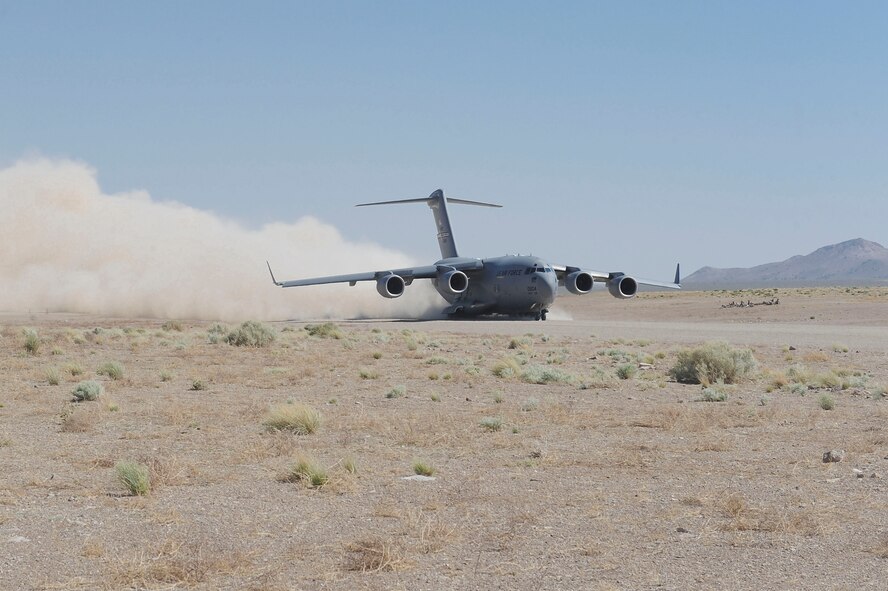 A C-17 Globemaster III taxies in at the Nevada Test and Training Range in Tonopah, Nev., May 23, 2012. The mass air mobility exercise, in which nearly 70 aircraft, primarily consisting of C-17 Globemaster III and C-130 Hercules aircraft, practiced forced entry operations. (U.S. Air Force photo by Staff Sgt. Ciara Wymbs/Released)