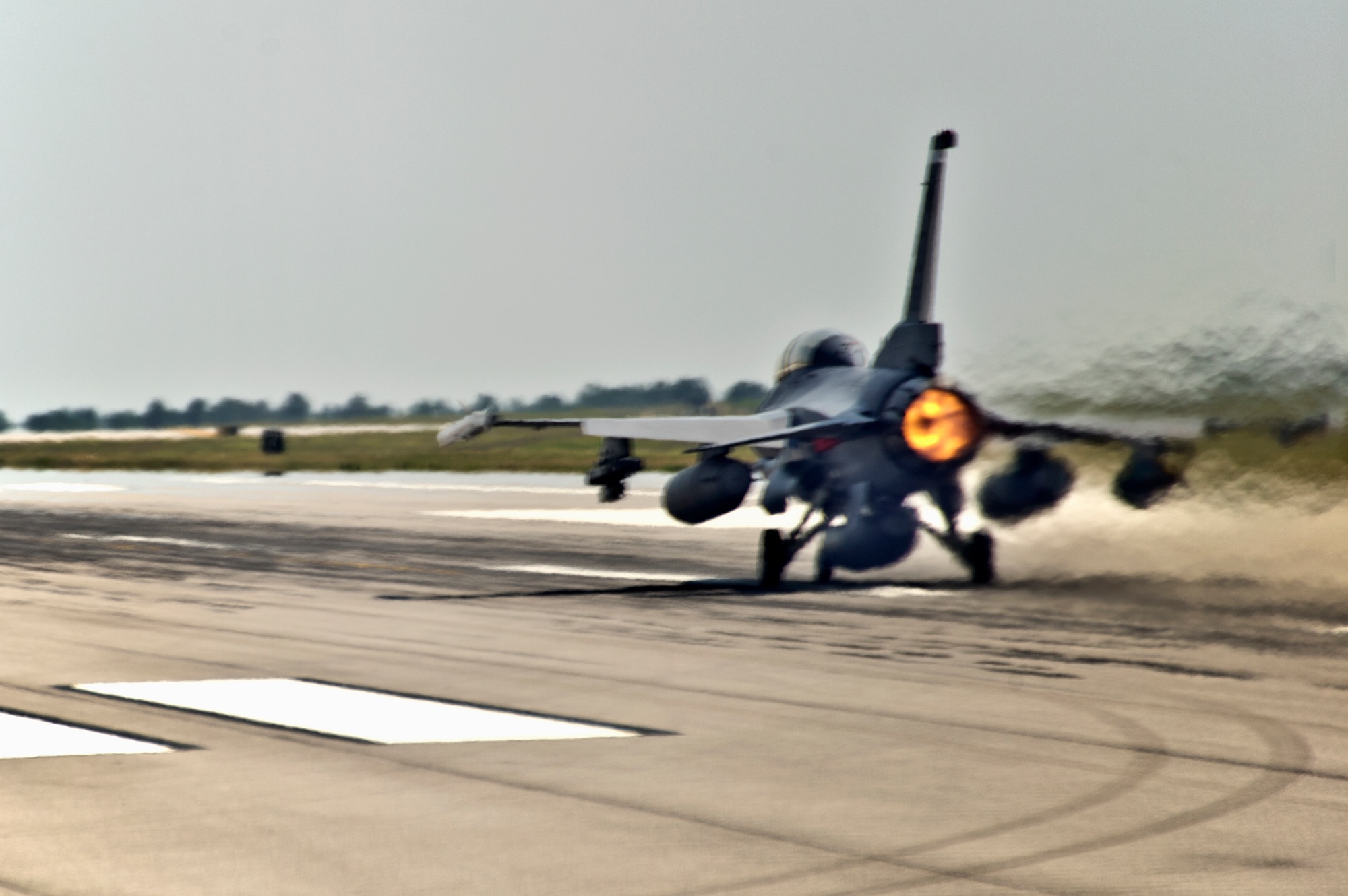 Squadron Leader Sion Hughes, a British exchange pilot and Capt. Gary Beisner, a 46th Operations Group test engineer, take off from Eglin Air Force Base, Fla., during a bomb rack unit jettison test May 21.  The mission collected separations data for the BRU-61carriage system loaded with a Guided Bomb Unit-39 over the Gulf of Mexico.  The F-16 Fighting Falcon is the first DoD aircraft to test jettison capabilities of the BRU-61.  (U.S. Air Force photo/Staff Sgt. Joely Santiago)