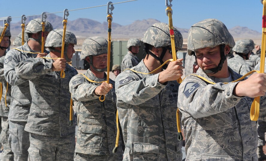 U.S. Air Force Airmen from the 820th RED HORSE Squadron participate in airborne sustainment training for Mobility Forces Exercise 12A at Nellis Air Force Base, Nev., May 22, 2012. The training prepared Airmen for future deployments with U.S. Army Soldiers. (U.S. Air Force photo by Staff Sgt. Ciara Wymbs/Released)