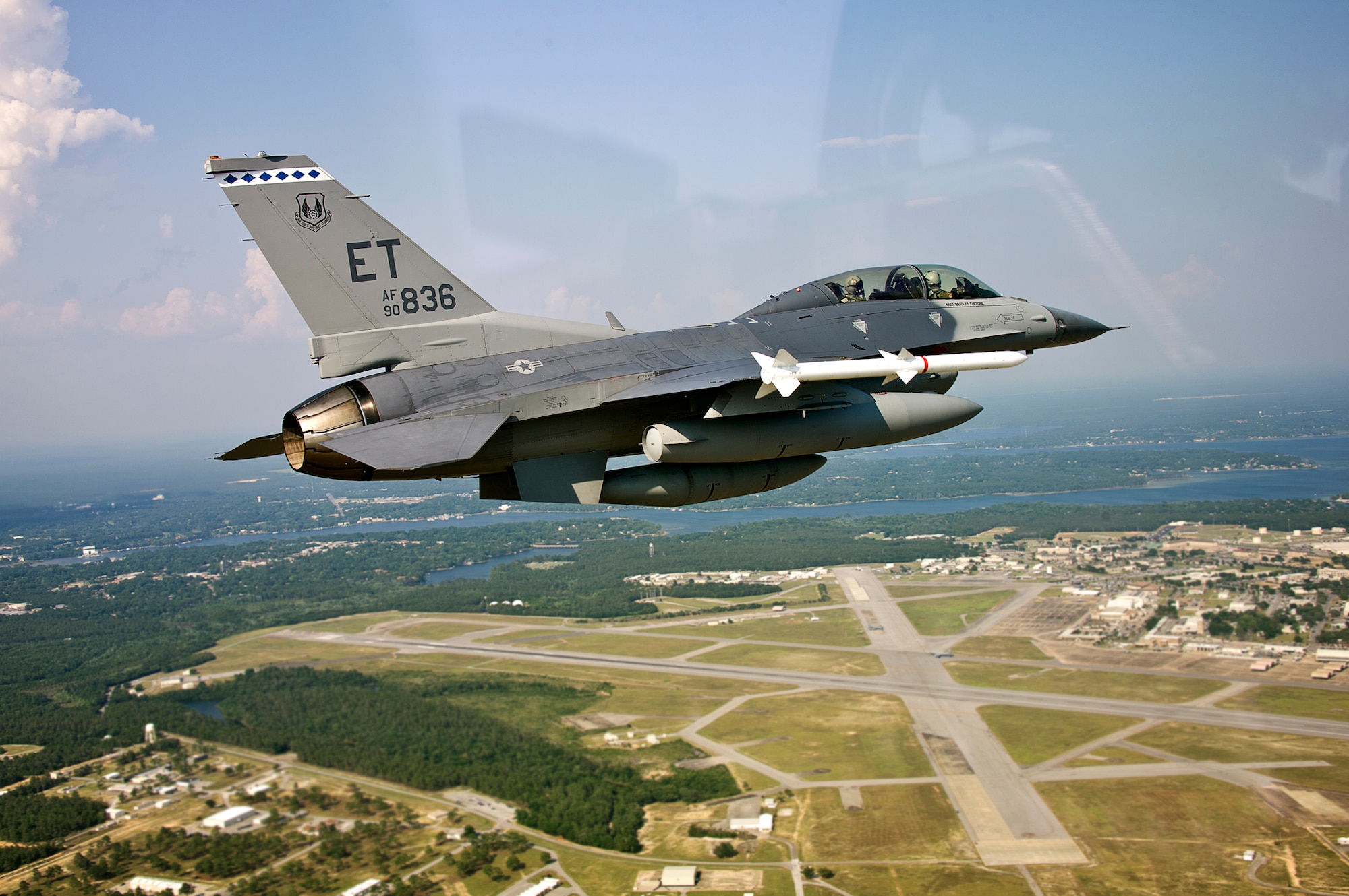 Squadron Leader Sion Hughes, a British exchange pilot and Capt. Gary Beisner, a 46th Operations Group test engineer, return to Eglin Air Force Base, Fla., after a bomb rack unit jettison test May 21.  The mission collected separations data for the BRU-61carriage system loaded with a Guided Bomb Unit-39 over the Gulf of Mexico.  The F-16 Fighting Falcon is the first DoD aircraft to test jettison capabilities of the BRU-61.  (U.S. Air Force photo/Staff Sgt. Joely Santiago)
