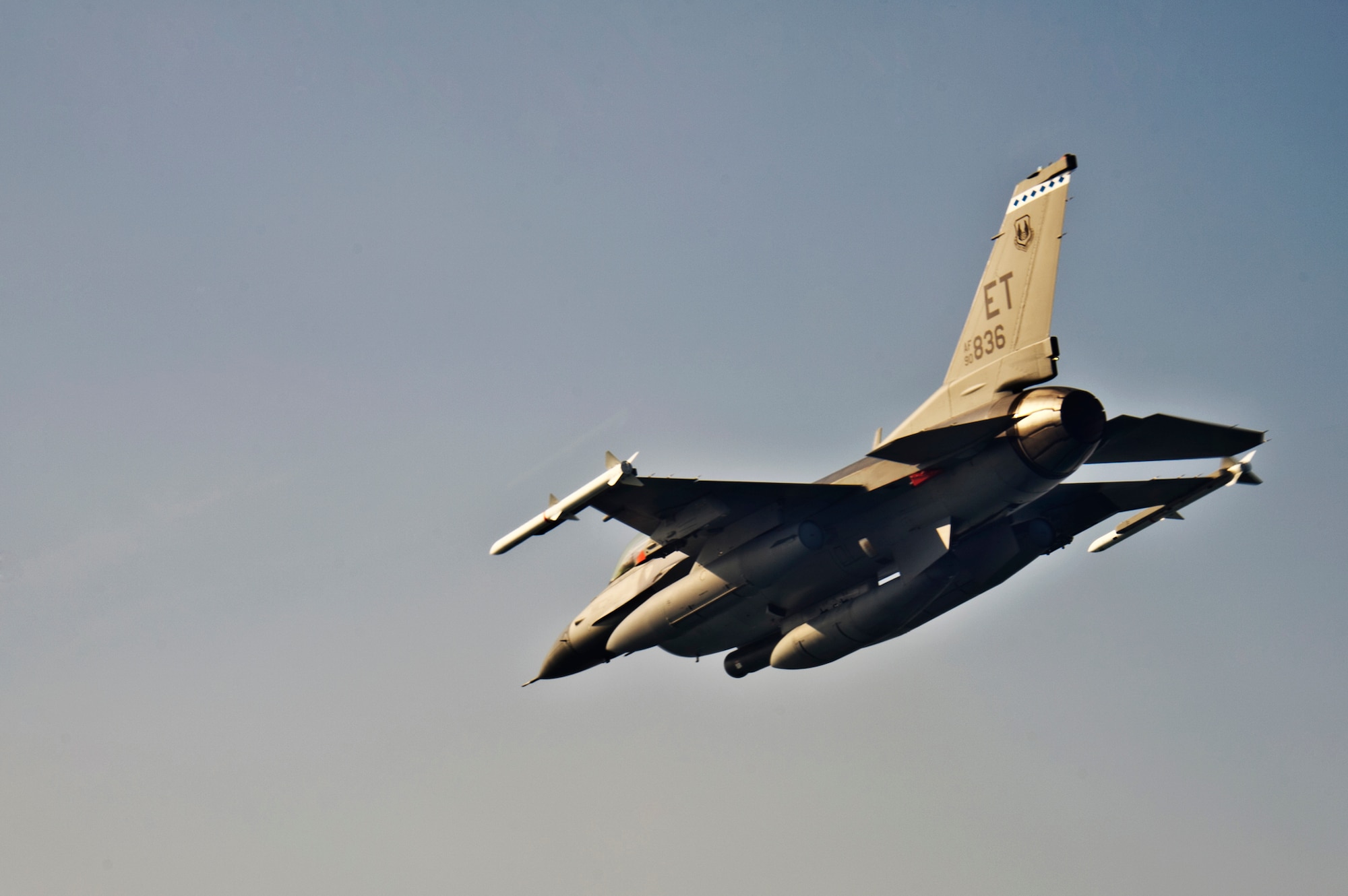 Squadron Leader Sion Hughes, a British exchange pilot and Capt. Gary Beisner, a 46th Operations Group test engineer, fly back to Eglin Air Force Base, Fla., after a bomb rack unit jettison test May 21.  The mission collected separations data for the BRU-61carriage system loaded with a Guided Bomb Unit-39 over the Gulf of Mexico.  The F-16 Fighting Falcon is the first DoD aircraft to test jettison capabilities of the BRU-61.  (U.S. Air Force photo/Staff Sgt. Joely Santiago)