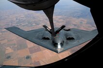 A KC-135 Stratotanker from the Nebraska Air National Guard's 155th Air Refueling Wing passes fuel to a B-2 Spirit May 22, 2012, over Southern Colorado. The KC-135, first deployed in 1956, is one of the Air Force's longest serving aircraft type. The B-2 fleet is one of the Air Force's youngest, reaching initial operational capability in 1997. Together, these two aircraft and their crews allow the Air Force to reach targets across the globe in a matter of hours. (U.S. Air Force photo/Duncan Wood)
