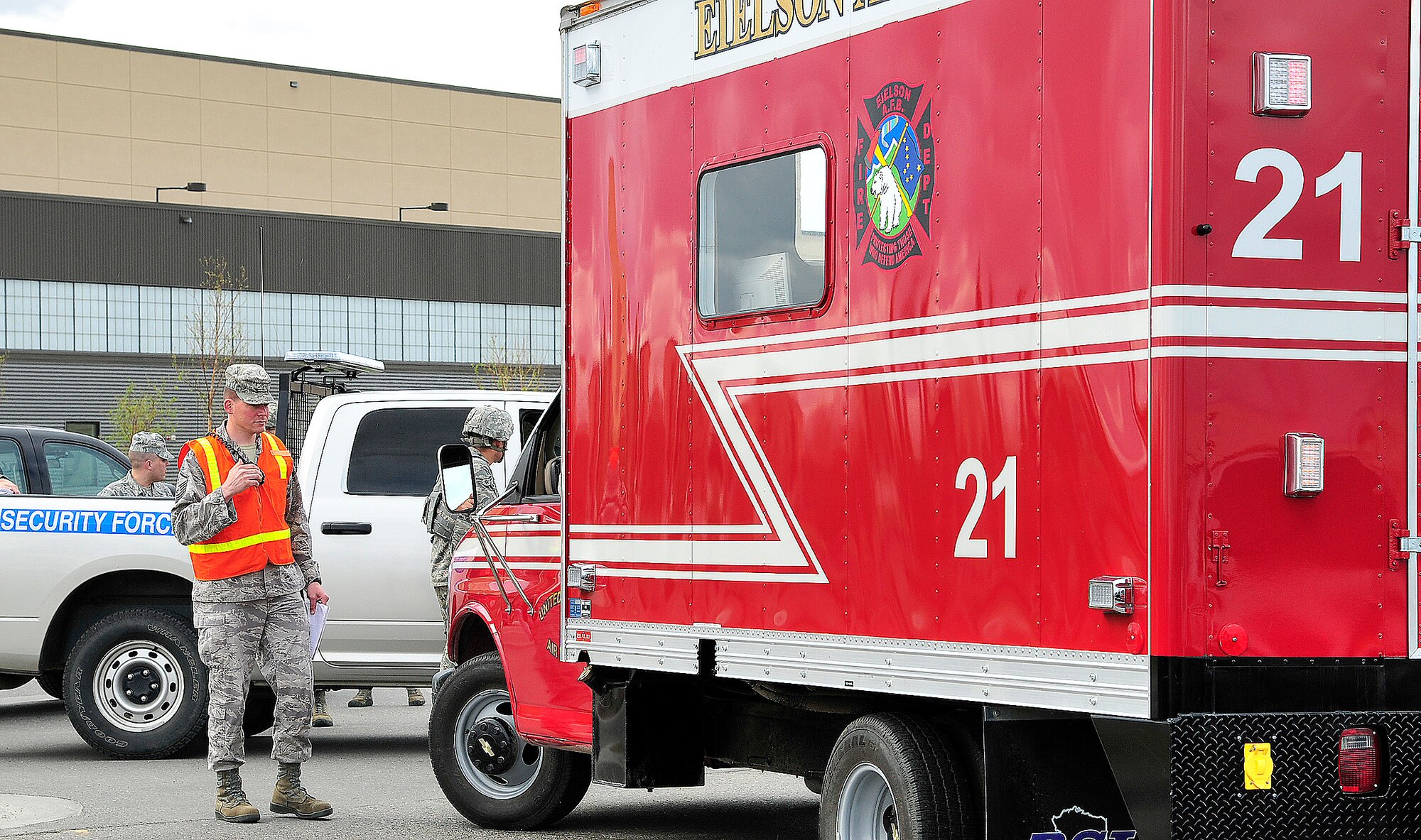 Eielson Air Force Base first-responders arrive on-scene during an active shooter exercise May 23, 2012, Eielson Air Force Base, Alaska. The exercise enabled joint responders to coordinate proper response procedures in a simulated environment. (U.S. Air Force photo/Airman 1st Class Zachary Perras)