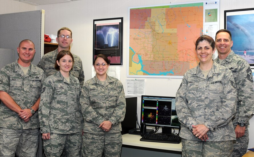 From left to right: Master Sgt. Joshua Buck, Tech. Sgt. Thomas Doerner, Staff Sgt. Robin Lewis, Staff Sgt. Renee Dunn, Tech. Sgt. Denette Tennell, and Chief Master Sgt. Kevin Jurgella. The 5th Bomb Wing Weather Flight is the sole weather agency on Minot Air Force Base. The flight is responsible for providing both the 91st Missile Wing and 5th Bomb Wing with meteorological services for all aspects of operations.  This includes supporting aircrews in the B-52H Stratofortress and UH-1 platforms, providing surface weather observations for airfield operations, and weather warnings for the Minot AFB community and the 91st Missile Wing Complex. (Photo Submission/Staff Sgt. Carmen Washington)