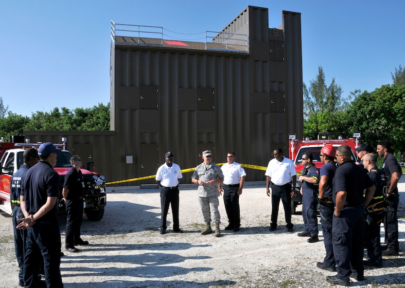 Col. Elwin A. Rozyskie Jr., 482nd Mission Support Group commander, addresses members of the 482nd Fire Department before cutting the ribbon on their new Class A burn facility at Homestead Air Reserve Base, May 30. The burn facility is used for live fire, search and rescue, technical rescue training, as well as several other functions. (U.S. Air Force photo/Ross Tweten)