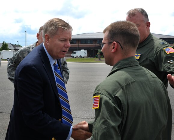 Staff Sgt. William Hooper, 437th Aircraft Maintenance Squadron, meets U.S. Sen. Lindsey Graham from South Carolina senator, upon his arrival May 29, 2012 to JB Charleston, S.C. Graham visited the base to have an open forum with JB Charleston leadership. (U.S. Air Force photo/Airman 1st Class Ashlee Galloway)