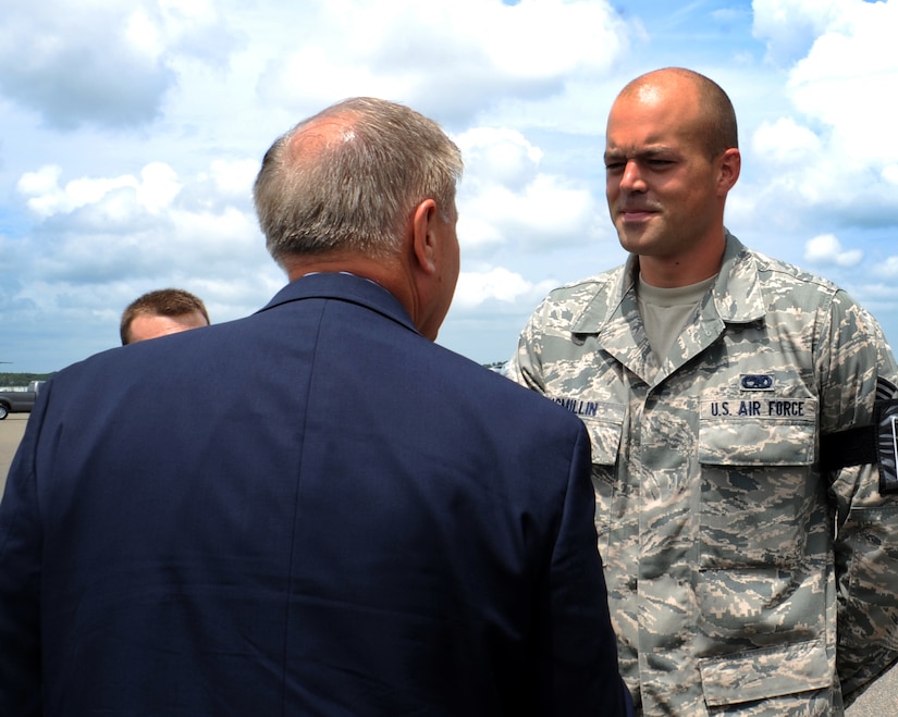 Senior Airman Cameron McMillin, 315th Aircraft Maintenance Squadron, meets U.S. Sen. Lindsey Graham from South Carolina upon his arrival May 29, 2012 to JB Charleston, S.C. Graham visited the base to have an open forum with JB Charleston leadership. (U.S. Air Force photo/Airman 1st Class Ashlee Galloway)