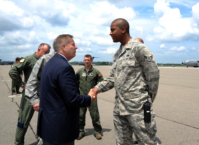 Airman 1st Class Rodrick Defreitas, 628th Logistics Readiness Squadron, meets U.S. Sen. Lindsey Graham from South Carolina upon his arrival May 29, 2012 to JB Charleston, S.C. Graham visited the base to have an open forum with JB Charleston leadership. (U.S. Air Force photo/Airman 1st Class Ashlee Galloway)
