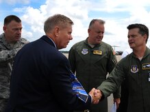 Colonel Russell Fingar (right), 315th Airlift Wing commander, Col. Erik Hansen (center), 437th Airlift Wing commander and Col. Richard McComb (left), Joint Base Charleston commander, greet U.S. Sen. Lindsey Graham from South Carolina upon his arrival May 29, 2012 to JB Charleston, S.C. Graham visited the base to have an open forum with JB Charleston leadership. (U.S. Air Force photo/Airman 1st Class Ashlee Galloway) 
