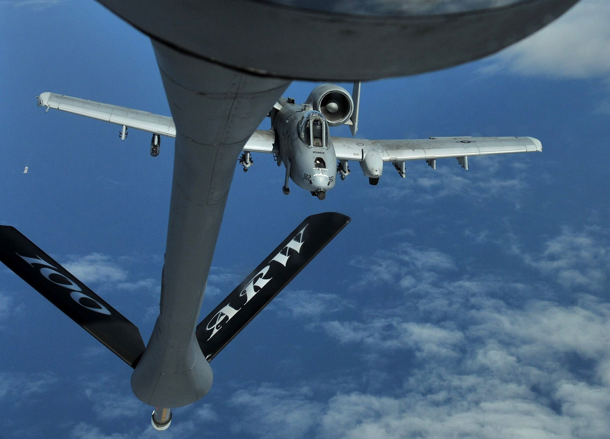 GERMANY – An A-10 Thunderbolt II, based out of Spangdahlem Air Base, Germany, trails behind a KC-135 Strantotanker, based out of RAF Mildenhall, prior to receiving fuel over Germany May 30, 2012. Two A-10s and several aircraft from France, Estonia and Latvia participated in the Baltic Region Training Event XII. (U.S. Air Force photo/Senior Airman Jerilyn Quintanilla)