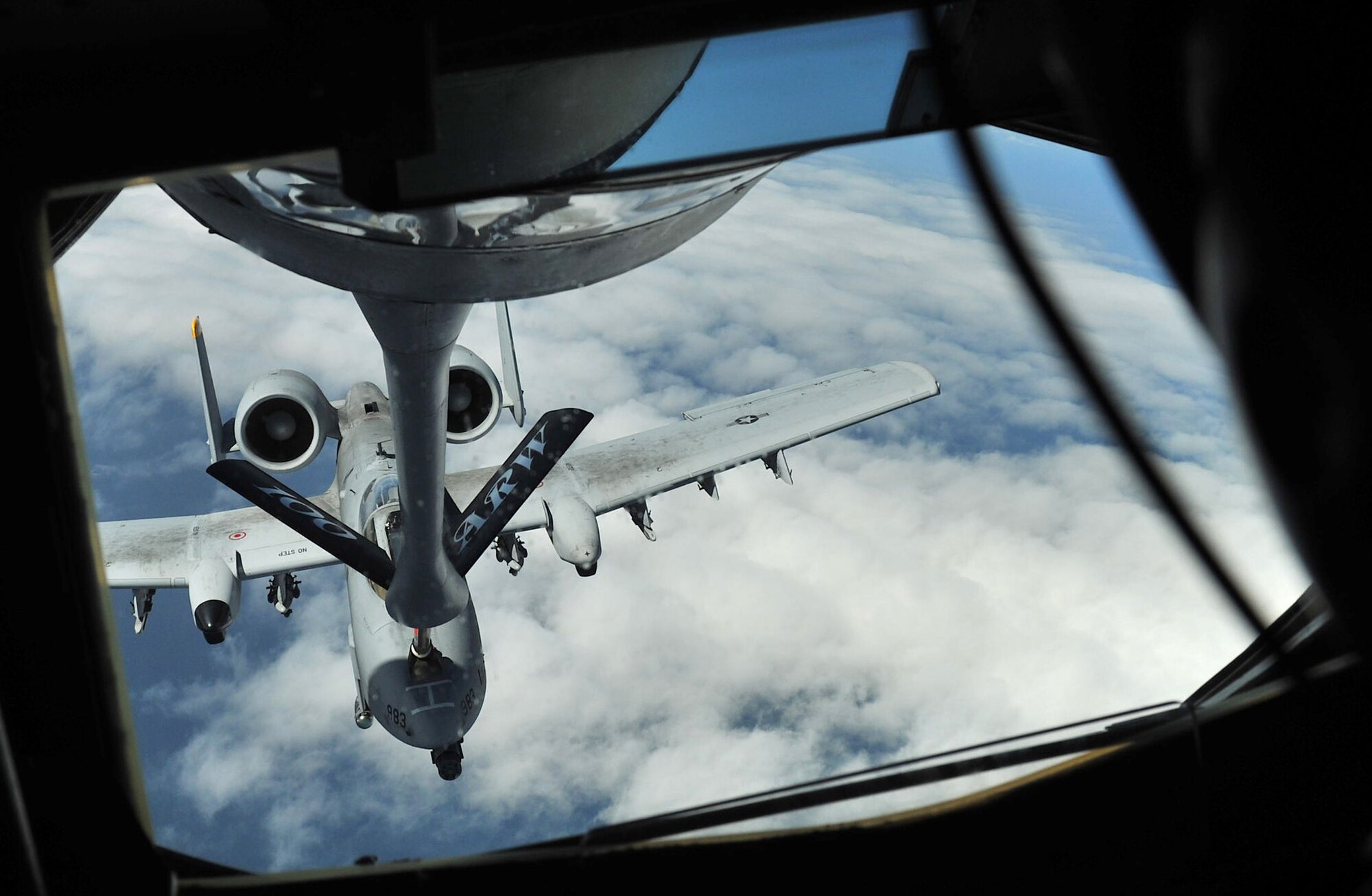 GERMANY – An A-10 Thunderbolt II, based out of Spangdahlem Air Base, Germany, receives fuel from a KC-135 Stratotanker, based out of RAF Mildenhall, England, in the skies over Germany May 30, 2012. The A-10 participated in the NATO and partner air forces’ Baltic Region Training Event XII, a two-day exercise that started May 29, 2012. (U.S. Air Force photo/Senior Airman Jerilyn Quintanilla) 