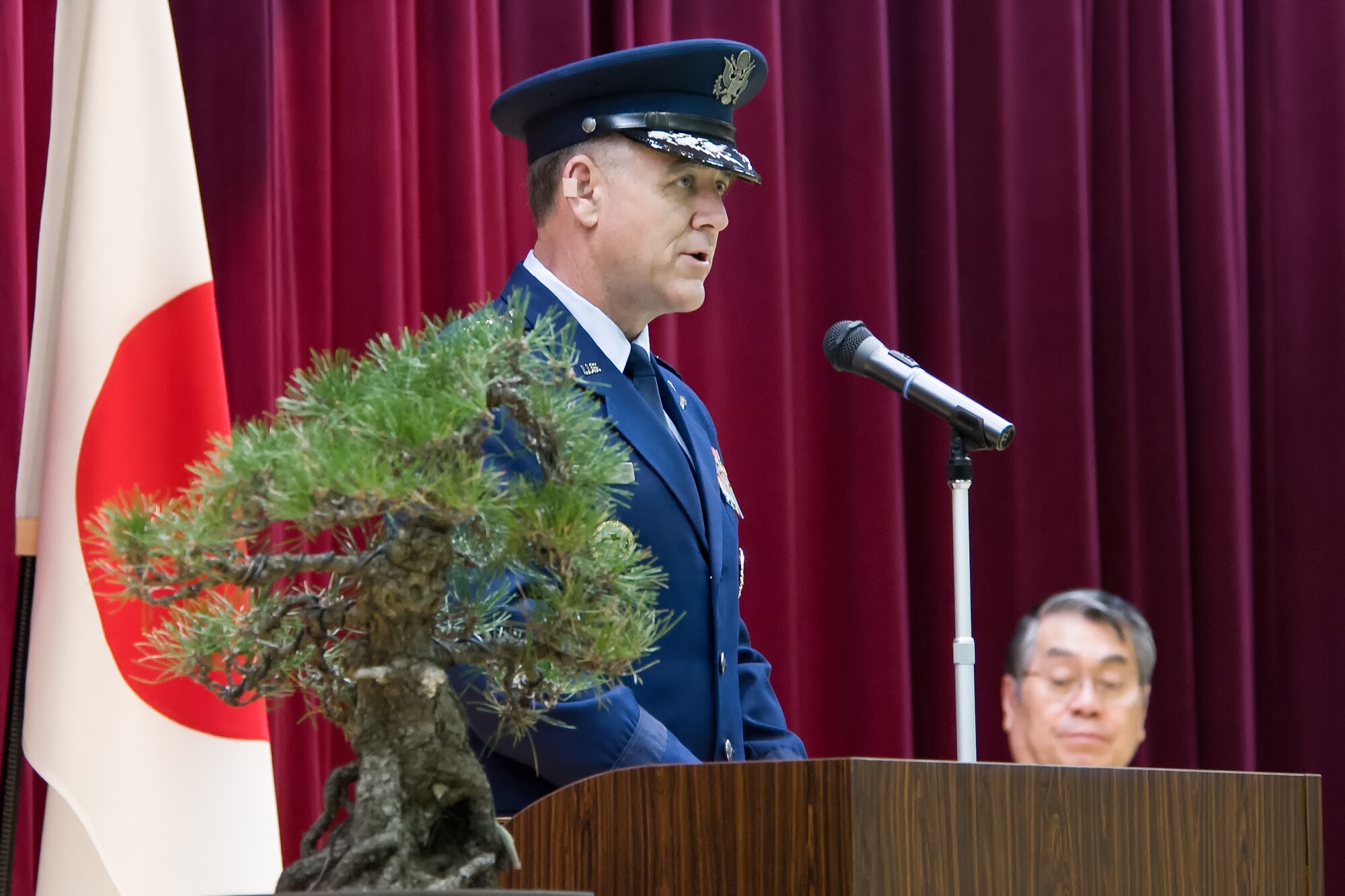 YOKOTA AIR BASE, Japan -- U.S. Air Force Lt. Gen. Burton Field, U.S. Forces Japan and Fifth Air Force commander, gives a speech during the Japan Air Self-Defense Force Air Defense Command Headquarters grand opening ceremony at Yokota Air Base, Japan, May 30, 2012. The ADC headquarters was relocated from Fuchu Air Base as part of the 2006 Realignment Roadmap, a bilateral initiative to enhance the U.S.-Japan Security Alliance and address force realignments in the Pacific. (U.S. Air Force photo by Airman 1st Class John D. Partlow)