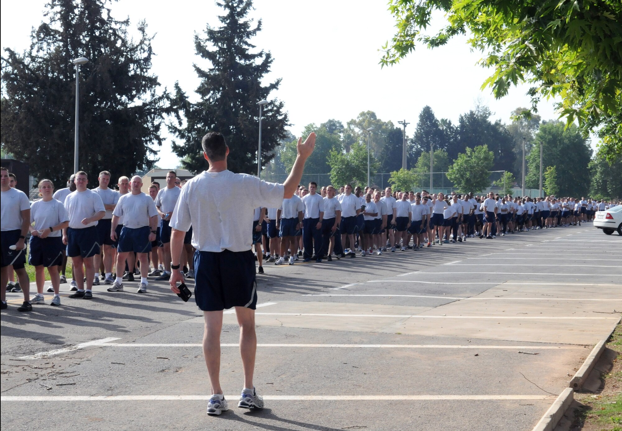 Col. Chris Craige, 39th Air Base Wing commander, briefs Airmen on the route they will follow for a wing run May 29, 2012, at Incirlik Air base, Turkey. The run was followed by a foreign-object-debris walk where U.S. and Turkish Airmen from the 39th ABW and the 10th Tanker Base Command, respectively, removed trash and debris from the flightline. (U.S. Air Force photo by Senior Airman Marissa Tucker/Released 