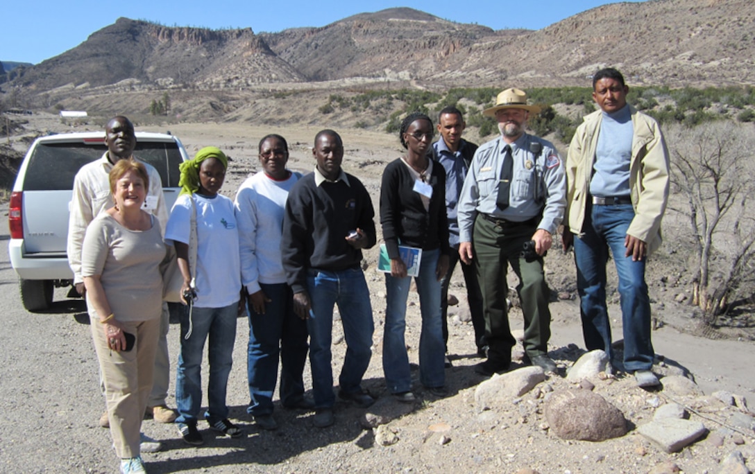 On March 27, 2012, Cochiti Project employees hosted seven professional water managers    representing five counties in the Sahel Region of Africa.  Specifically, the water managers represented Burkina Faso, Mali, Mauritania, Niger and Senegal.  The visitors and their    interpreter are shown with Supervisory Park Ranger Mark Rosacker (second from right). 