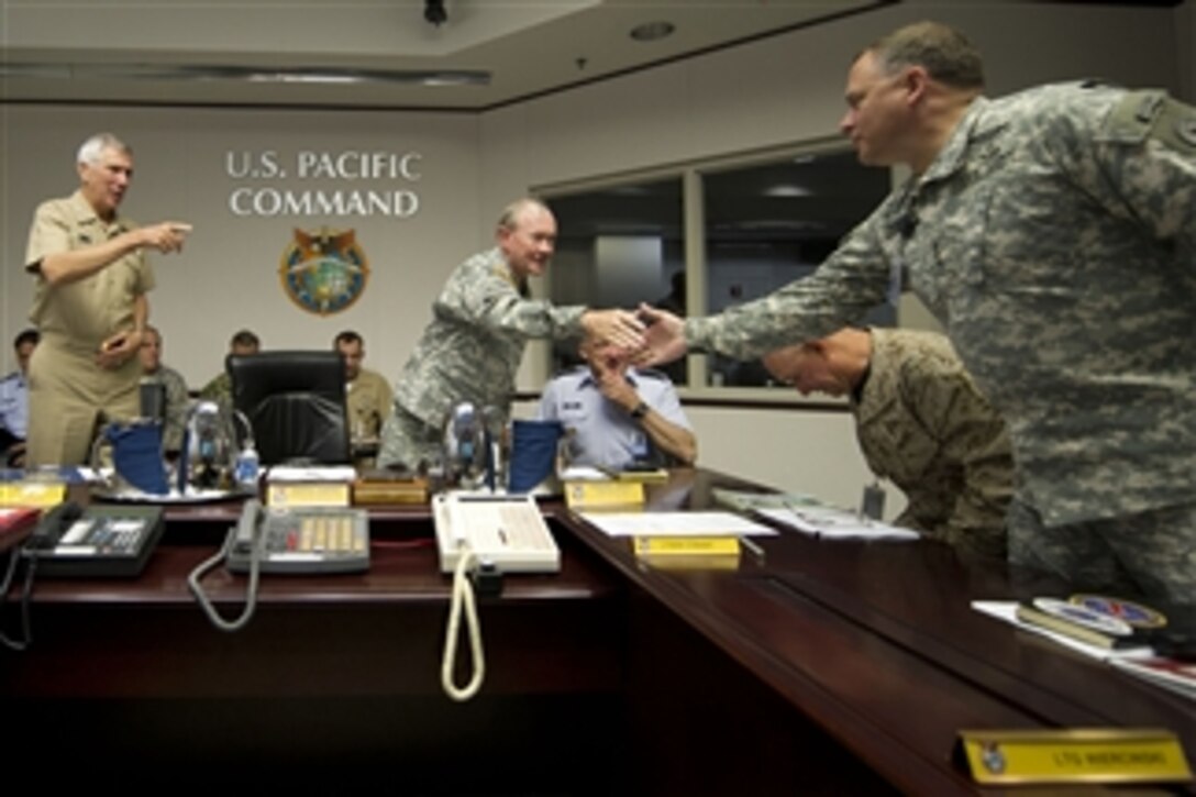 Commander, U.S. Pacific Command Adm. Samuel J. Locklear (left) introduces senior members of his staff to Chairman of the Joint Chiefs of Staff Gen. Martin E. Dempsey before a meeting in the U.S. Pacific Command Headquarters at Camp Smith, Hawaii, on May 28, 2012.  