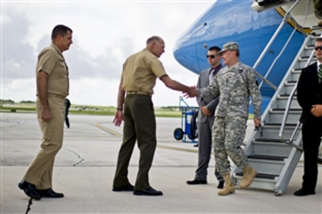 Marine Corps Lt. Gen. Duane D. Thiessen, commander of U.S.  Marine Corps Forces Pacific, greets Army Gen. Martin E. Dempsey, chairman of the Joint Chiefs of Staff, on Andersen Air Force Base, Guam, May 30, 2012.