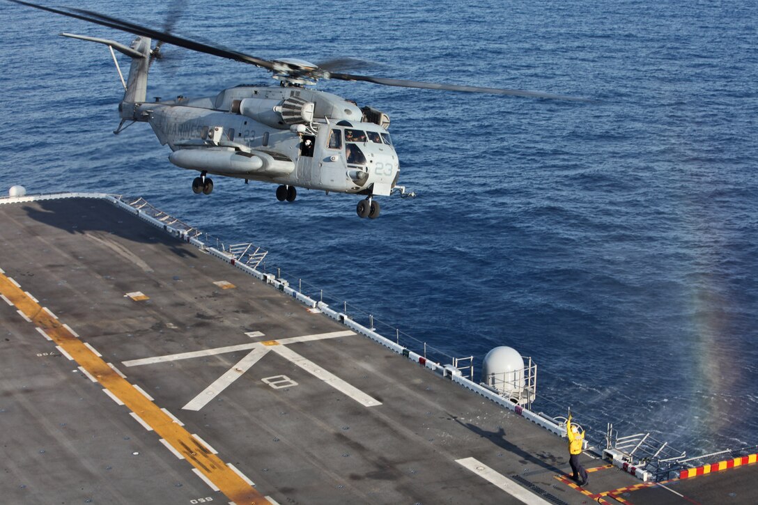 A CH-53E Super Stallion from Marine Medium Helicopter Squadron 364, 15th Marine Expeditionary Unit, takes off from the flight deck of the USS Peleliu during Phibron 3 and the 15th MEU’s PHIBRON-MEU Interoperability Training exercise off the coast of Southern Calif., May 31. The exercise is the MEU’s first time at-sea as an entire Marine Air Ground Task Force and gives Marines and sailors the opportunity to become familiar working together as a blue-green team.