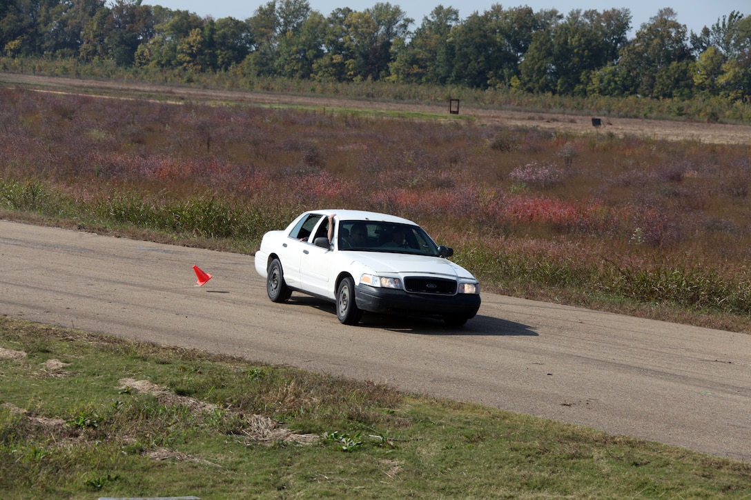 A Marine with Special-Purpose Marine Air-Ground Task Force Africa knocks over a traffic cone while negotiating through a series of obstacles at high speeds at the Tier 1 Group Training Center in Crawfordsville, Ark., Oct. 13, 2012. Special-Purpose MAGTF Africa is training in preparation for its upcoming deployment.