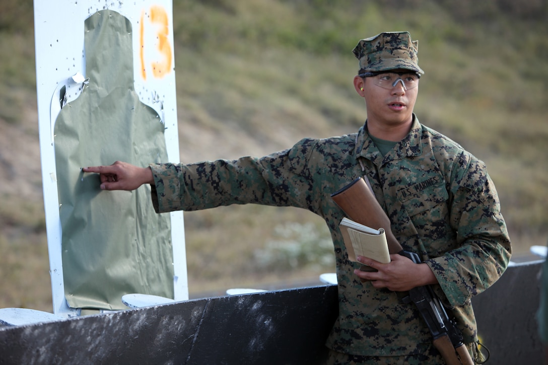 Sgt. Xin Huang, a machine-gunner with Special-Purpose Marine Air-Ground Task Force Africa, instructs a class on AK-47 assault rifle firing techniques at the Tier 1 Group Training Facility, in Crawfordsville, Ark., Oct. 23, 2012. Each Marine was required to instruct at least one class in preparation for their upcoming deployment.