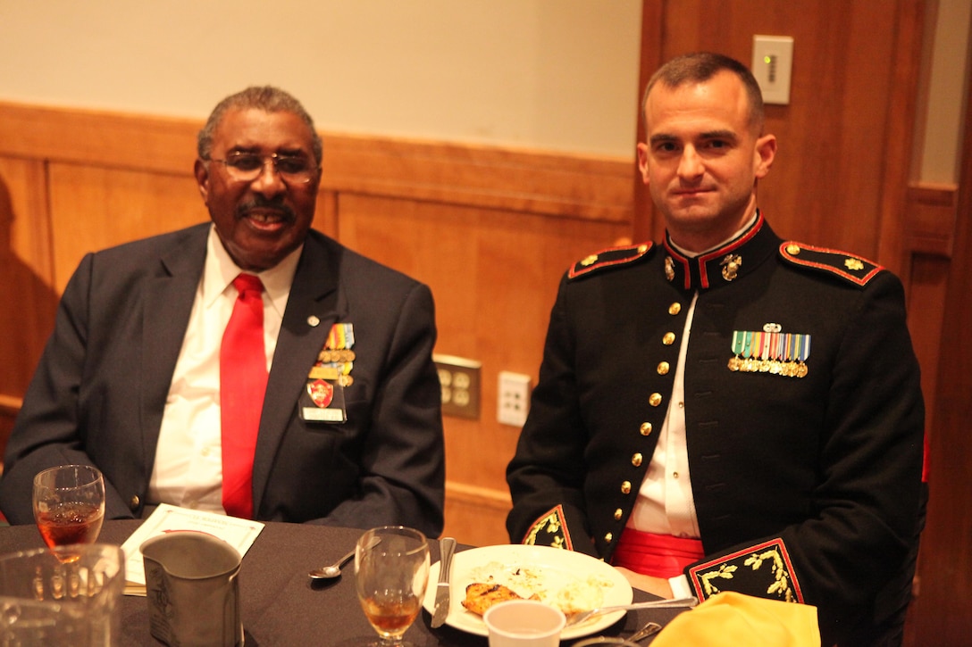 Maj. Daniel M. Bartos, the officer in charge of supply management with 2nd Supply Battalion, 2nd Marine Logistics Group, shares a spot at the head table with Adner Batts, one of the original members of the Montford Point Marines, during the battalion’s Marine Corps Birthday ball in New Bern, N.C., Oct. 29, 2012. The battalion invited the Montford Point Marines to join in the festivities and to honor them for their unique contribution to the unit’s history.