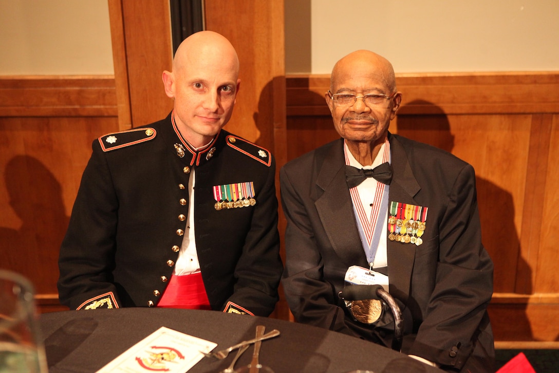 Lt. Col. Jesse A. Kemp, the commanding officer of 2nd Supply Battalion, 2nd Marine Logistics Group, shares a spot at the head table with Turner G. Blount, one of the original members of the Montford Point Marines, during the battalion’s Marine Corps Birthday ball in New Bern, N.C., Oct. 29, 2012. The battalion invited the Montford Point Marines to join in the festivities and to honor them for their unique contribution to the unit’s history.
