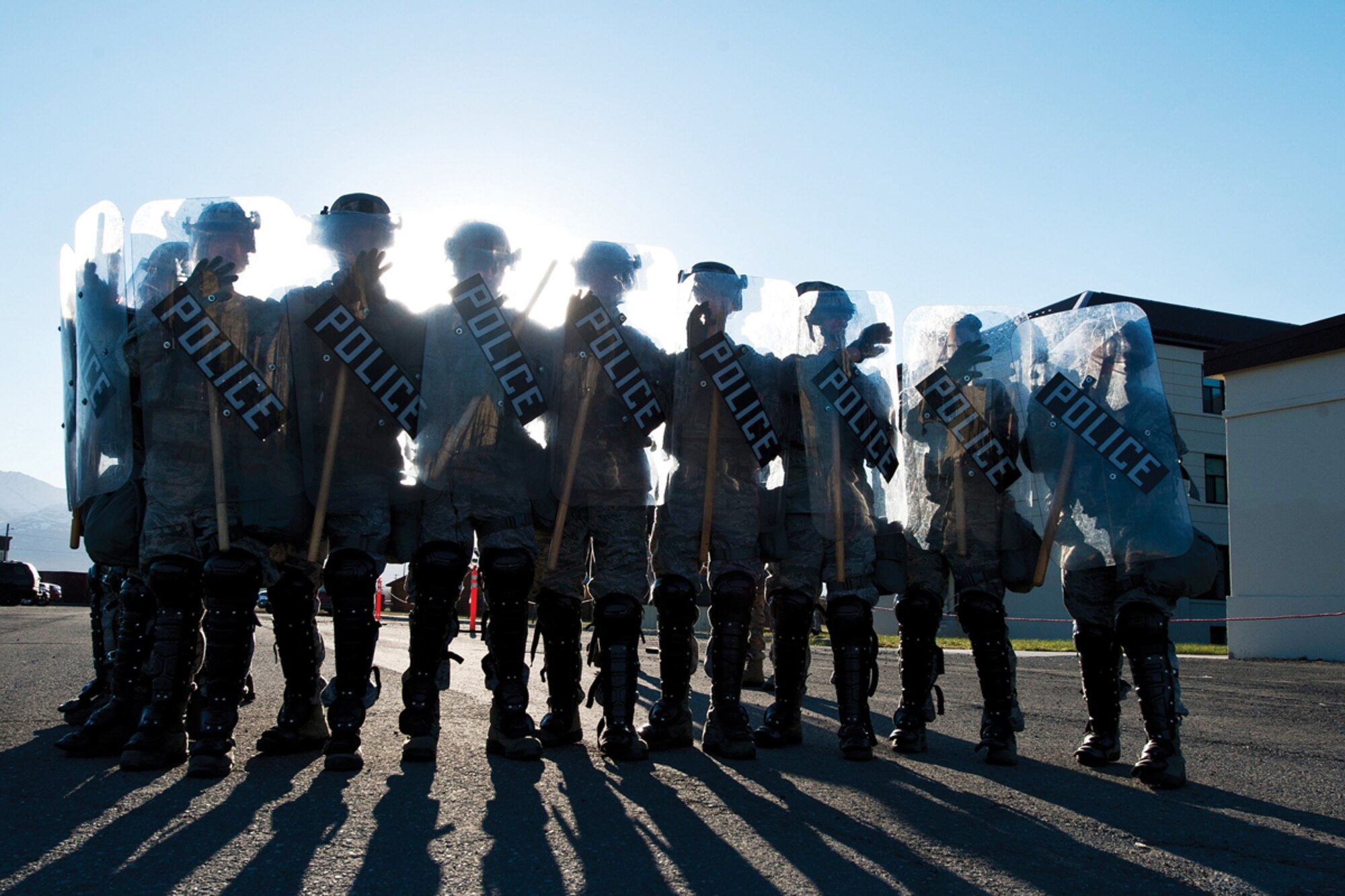 Airmen of the 673d Security Forces Squadron advance in multiple formations as part of civil-disturbance training. The Airmen are preparing during Exercise Polar Force 12-7 for real-world situations. (U.S. Air Force Photo/Airman 1st Class Omari Bernard)