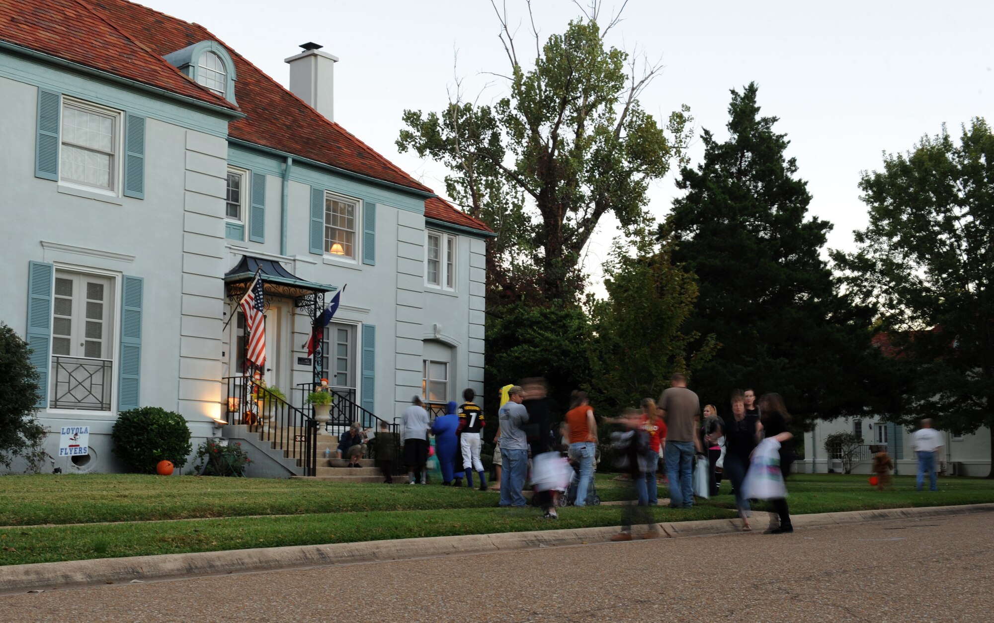 Members of Team Barksdale trick-or-treat during Halloween on Barksdale Air Force Base, La., Oct. 31. From 5:30 p.m. to 8:00 p.m. the base housing areas was open to Barksdale Airmen and their families for trick-or-treating. (U.S. Air Force photo/Airman 1st Class Benjamin Gonsier)(RELEASED)
