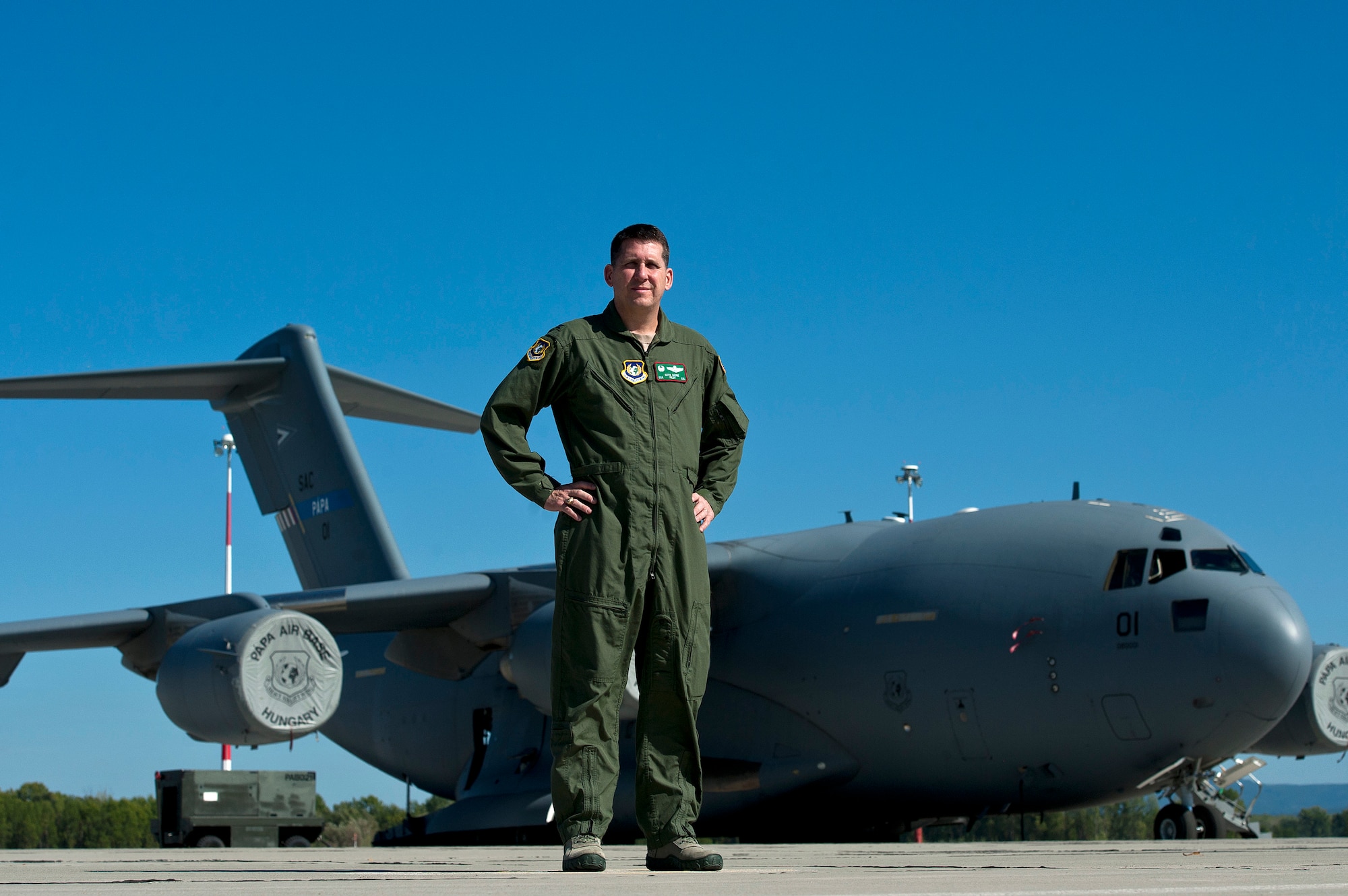Col. Keith Boone, Heavy Airlift Wing Commander, oversees the strategic airlift operations and personnel of 12 different nations of the Strategic Airlift Capability Program at Papa Air Base, Hungary. (U.S. Air Force photo/Tech. Sgt. Bennie J. Davis III)