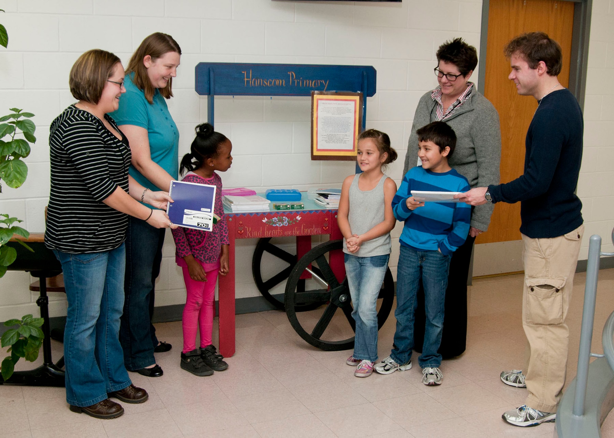 HANSCOM AIR FORCE BASE, Mass. -- Members of the Junior Force Council donate school supplies collected through an on-base school supply drive to the Hanscom Primary School Oct. 26. Donations were collected and distributed to the primary school and Lowell Wish Project. (U.S. Air Force photo by Mark Wyatt)