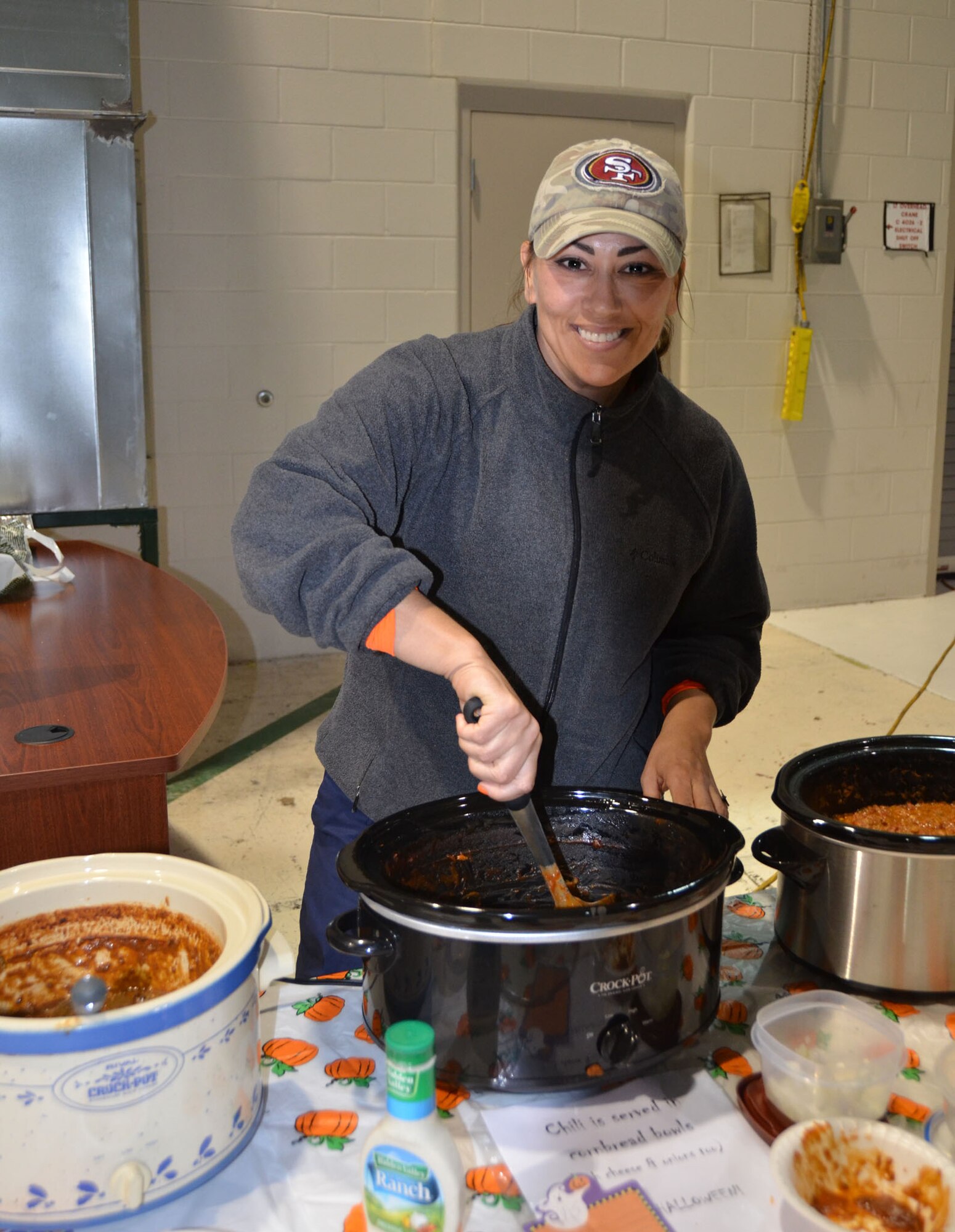 WRIGHT-PATTERSON AIR FORCE BASE, Ohio - Staff Sgt. Tame Marshall, 445th Aircraft Maintenance Squadron, communication and navigation systems craftsman, took first place in the 445th Airlift Wing Chili Cook-off with her “Get some chili.” The wing raised $380 for the Combined Federal Campaign. (U.S. Air Force photo/Stacy Vaughn)