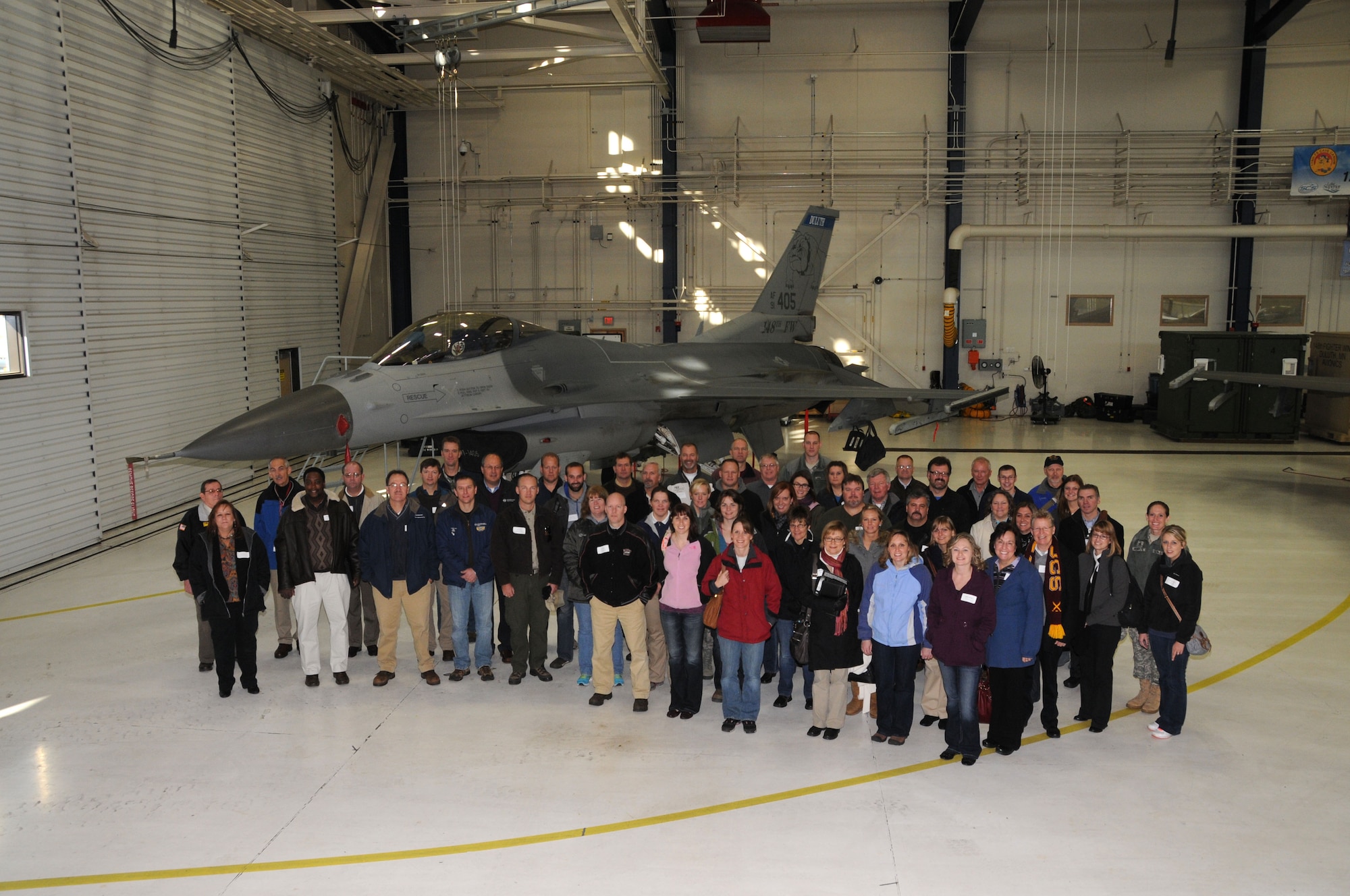 Employers and educators from central and northern Minnesota pose for a group shot at the 148th Fighter Wing, Duluth, Minn. while participating in an Employer Support for the Guard and Reserve (ESGR) event.  The goal of this ESGR event was to provide employers and educators perspective on the Minnesota National Guard's mission.  (National Guard photo by Master Sgt. Ralph J. Kapustka / Released)