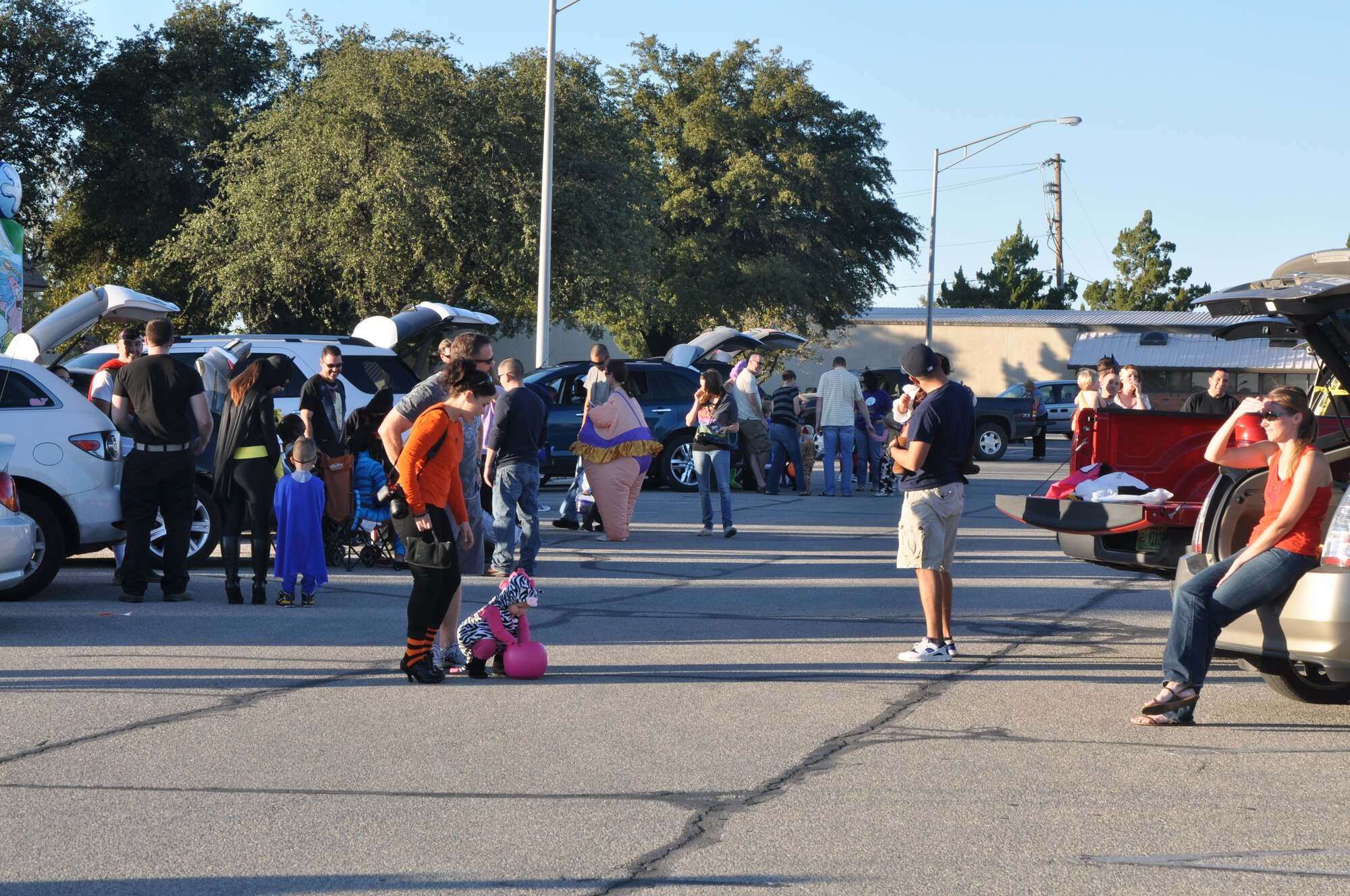GOODFELLOW AIR FORCE BASE, Texas – Trunk or Treat is underway at the Base Theater parking lot here Oct. 31. This Halloween, Trunk or Treat is offered as an alternative to going door to door for candy. (U.S. Air Force photo/ Airman 1st Class Joshua Edwards)