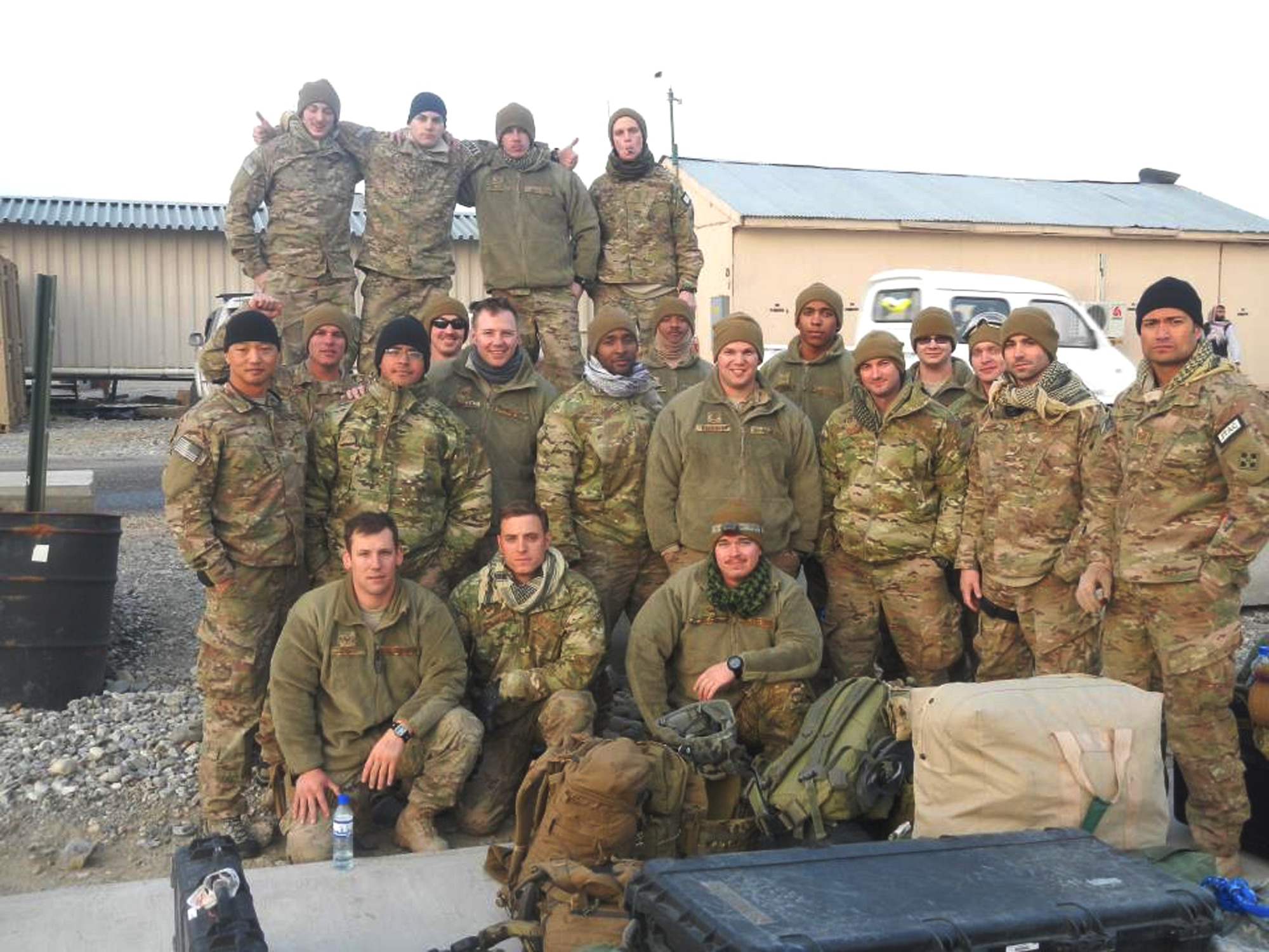 U.S. Air Force Maj. Walter D. Gray (2nd row, far left) stands with his men for a group photo in Afghanistan. Gray was killed in a suicide bomber attack in Kunar Province, Afghanistan, Aug. 8, 2012. (Courtesy Photo)