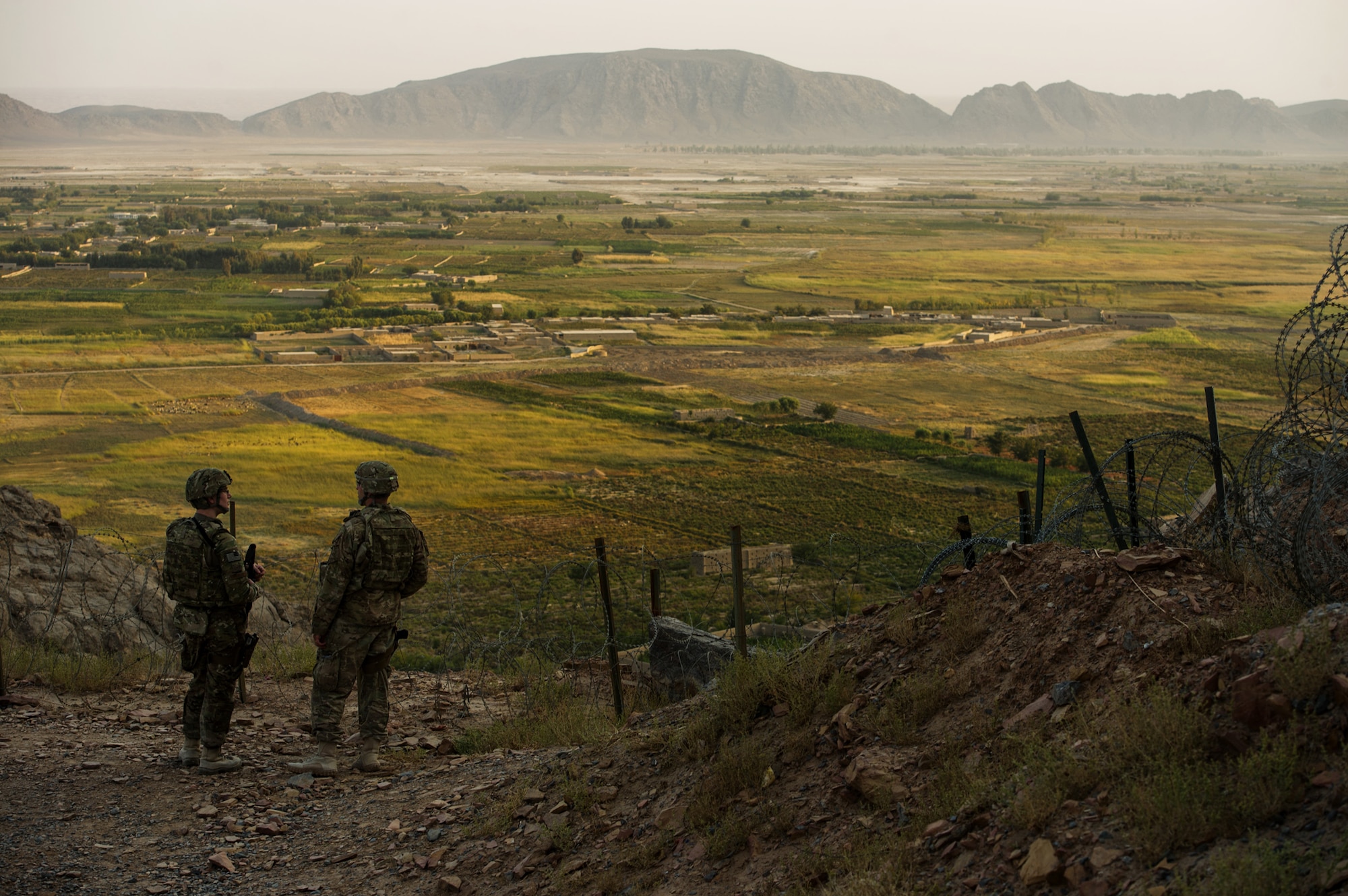 U.S. Air Force Staff Sgt. Adam Gagne, right, and Senior Airman Adam Chmielowski, both 19th Expeditionary Weather Squadron battlefield weather forecasters, make a weather observation on Oct. 10, 2012, at Forward Operating Base Masum Ghar, Afghanistan. The 19th EWS provides Army ground commanders with accurate and real-time weather conditions and offers alternative options to help commanders make informed decisions on combat operations. (U.S. Air Force photo/Staff Sgt. Jonathan Snyder)