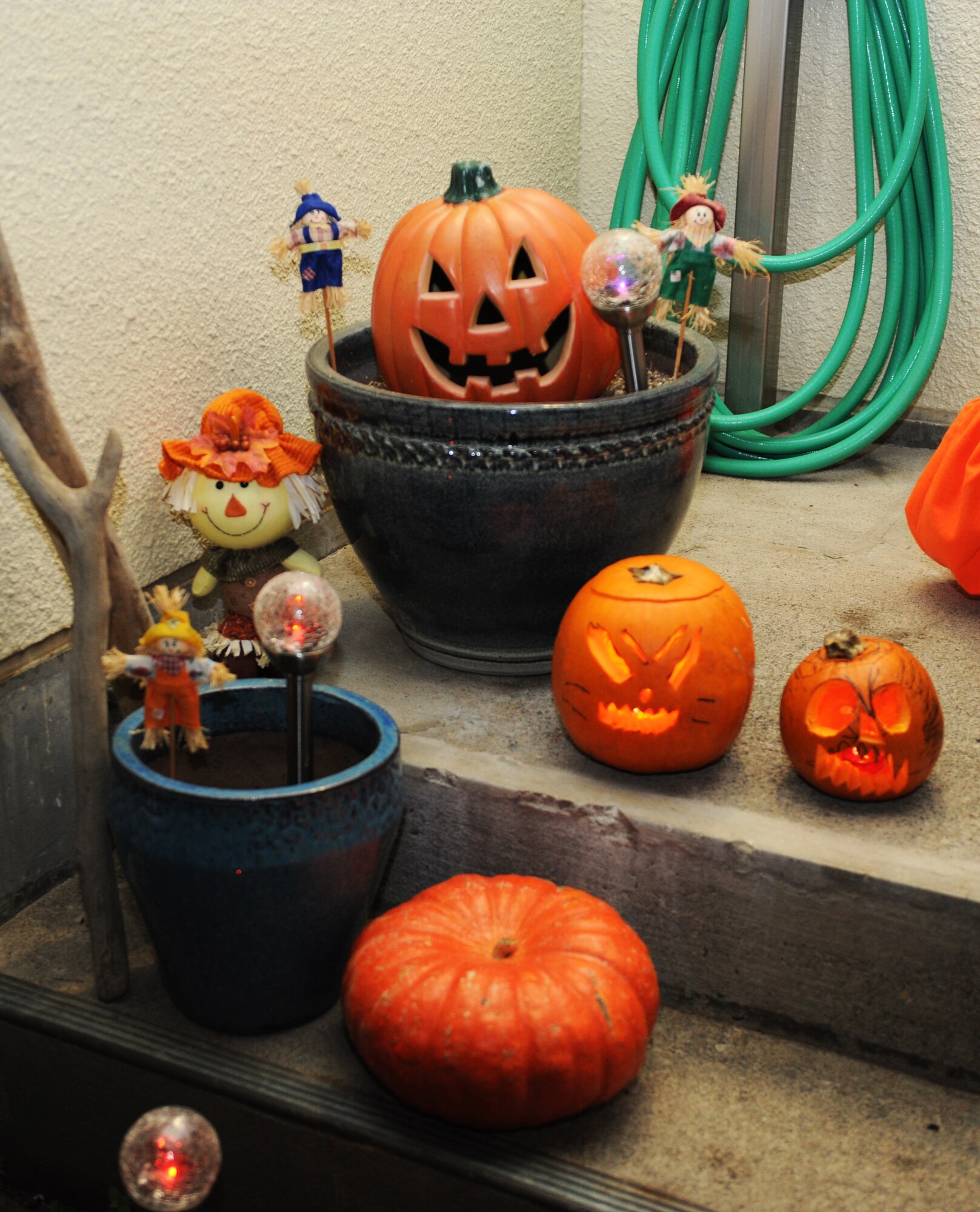 Jack O ‘Lanterns and other Halloween decorations sit on stairs during Halloween at Misawa Air Base, Japan, Oct. 31, 2012. The first Jack O ‘Lanterns were believed to be carved out of turnips. (U.S. Air Force photo by Airman 1st Class Kia Atkins)