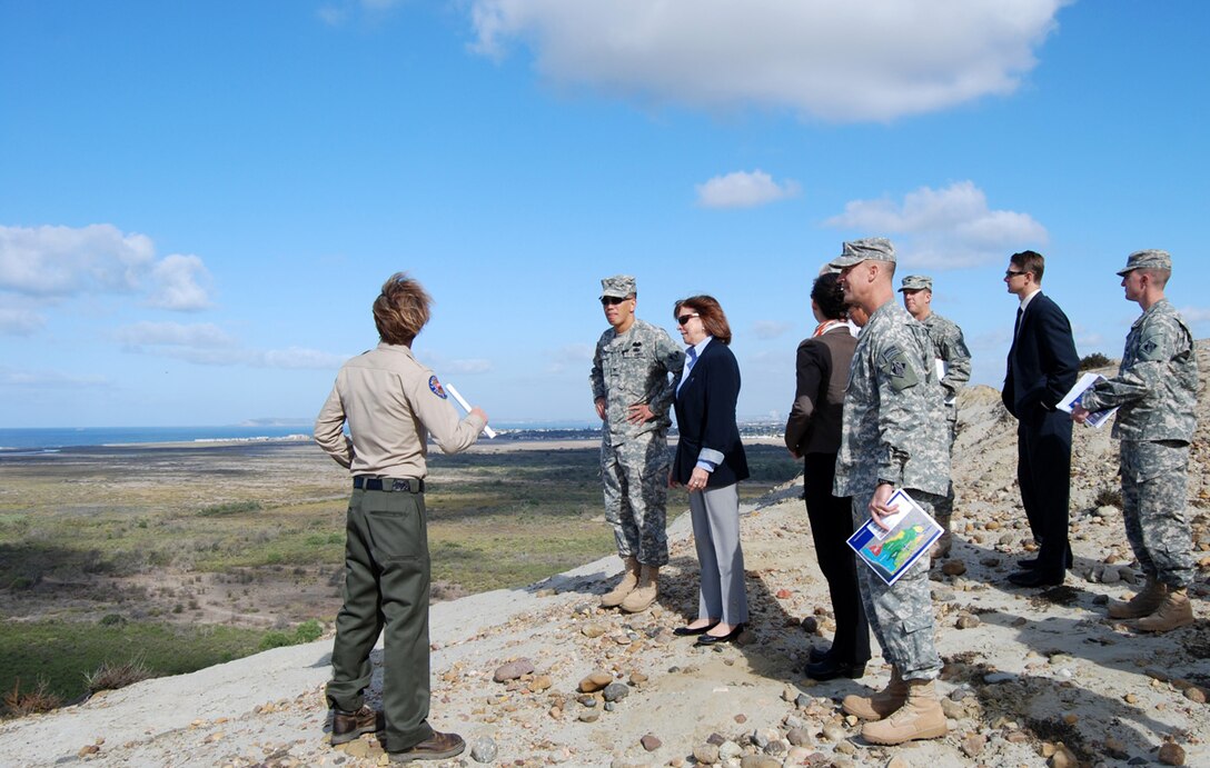 Chris Peregrin (left), manager of Tijuana Preserve for the California Department of Fish and Game, briefs Jo-Ellen Darcy, Assistant Secretary of the Army for Civil Works, during an Oct. 24 visit to Spooners Gulch and the Tijuana River Watershed.