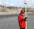 Survey Technician Angelica De-Hoyos Molina uses GPS to survey damages along the New Jersey shore following historic Hurricane Sandy. 