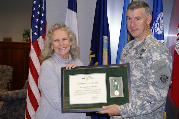 Maggie Hellwege, Equal Employment Office, received a Commanders Award for Civilian Service Nov. 1 to congratulate her on her retirement after 31 years of federal service. 