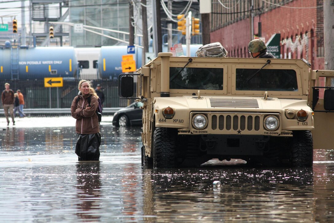 Soldiers assist residents displaced by Hurricane Sandy in Hoboken, N.J., Oct. 31, 2012. The soldiers are assigned to the New Jersey National Guard.