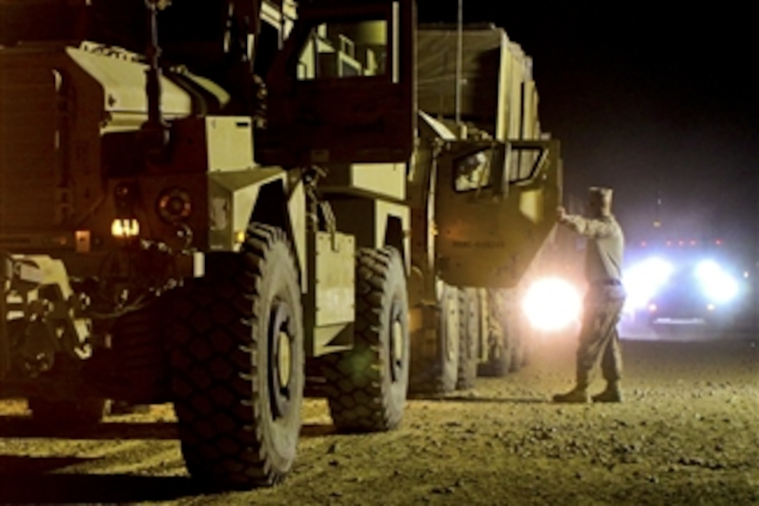 Marines with Combat Logistics Battalion 2, Combat Logistics Regiment 15, prepare a convoy for a resupply mission to three forward operating bases from Camp Leatherneck, Afghanistan, on Oct. 23, 2012.  