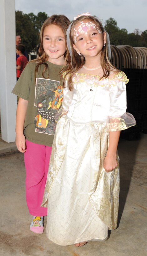 Children outfitted in festive Halloween costumes pose for a photo during Marine Corps Logistics Base Albany’s second annual Harvest Festival, Oct. 27.