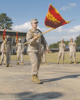 Seventeen Marines, participating in their first professional military education course, the Corporals Course, train many hours practicing basic drill movements and learning the proper use of the NCO sword and guidon for formations and ceremonies.
