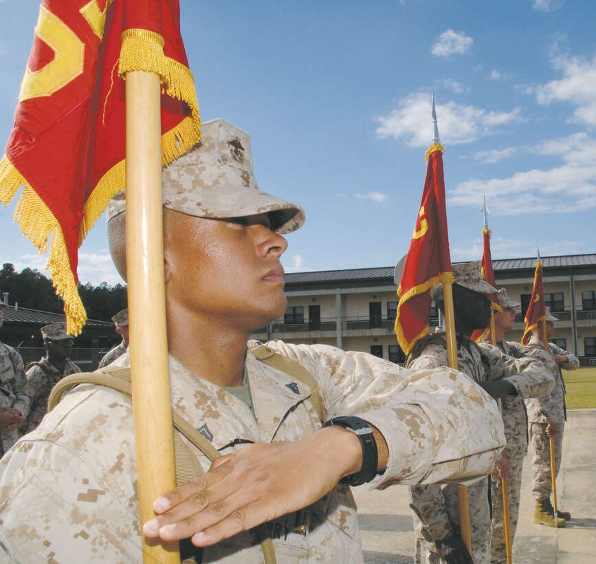 Seventeen Marines, participating in their first professional military education course, the Corporals Course, train many hours practicing basic drill movements and learning the proper use of the NCO sword and guidon for formations and ceremonies.