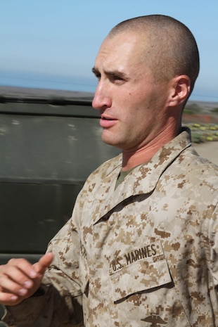 Pfc. Ben Pack, Platoon 3221, Co. K, 3rd Recruit Training Battalion, returns to his platoon after turning in his gear Oct. 29 at Edson Range aboard Marine Corps Base Camp Pendleton, Calif. This is Pack's second time with Co. K after suffering a stress fracture in his right leg 6 years ago.