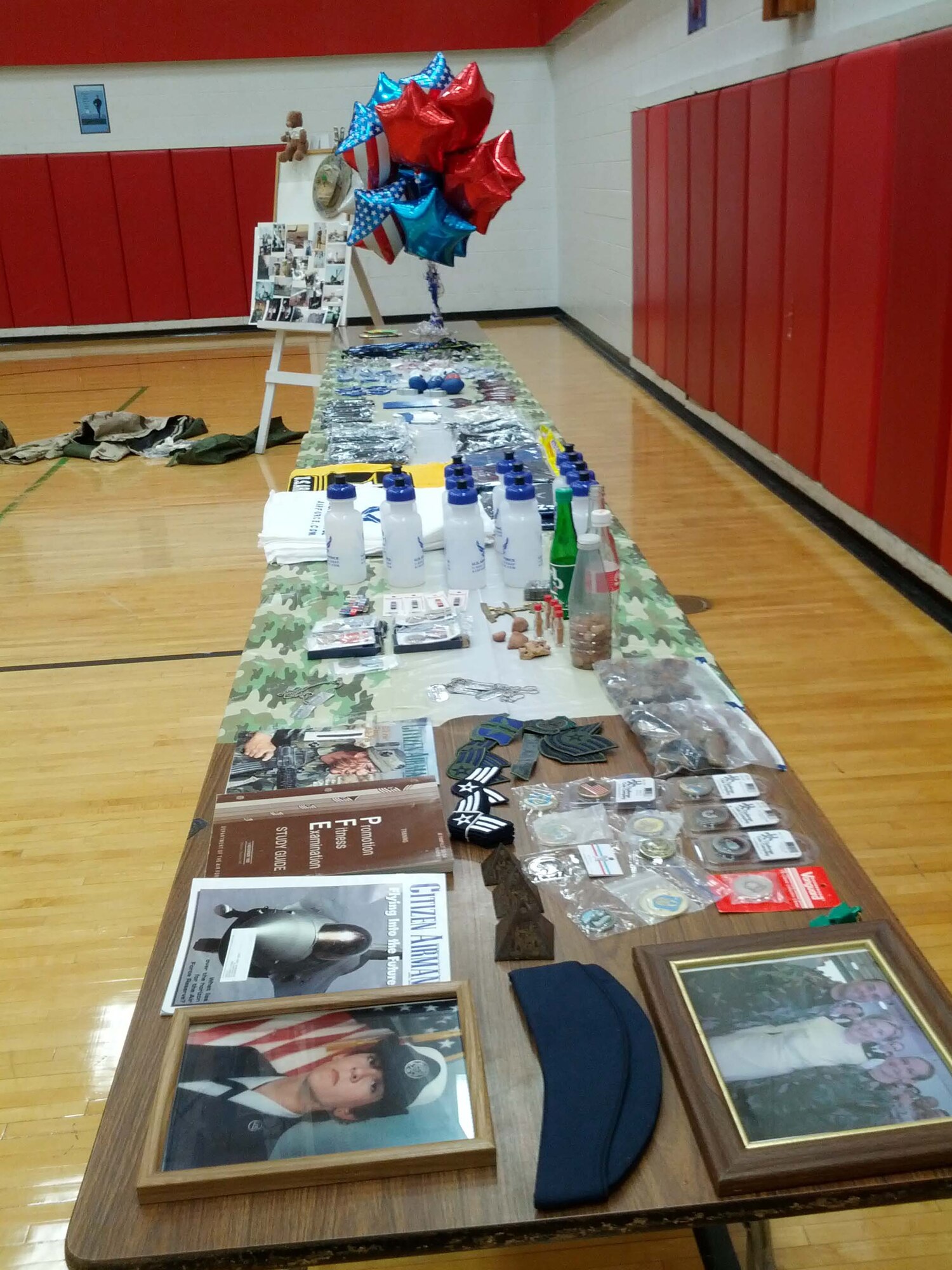 Tech. Sgt. Wendy Curry, a personnel craftsman with the 914th Force Support Squadron, set up an exhibit including personal memorabilia to share with sixth grade students during Career Day at Palmyra Macedon Middle School in Palmyra, N.Y. (Courtesy photo)