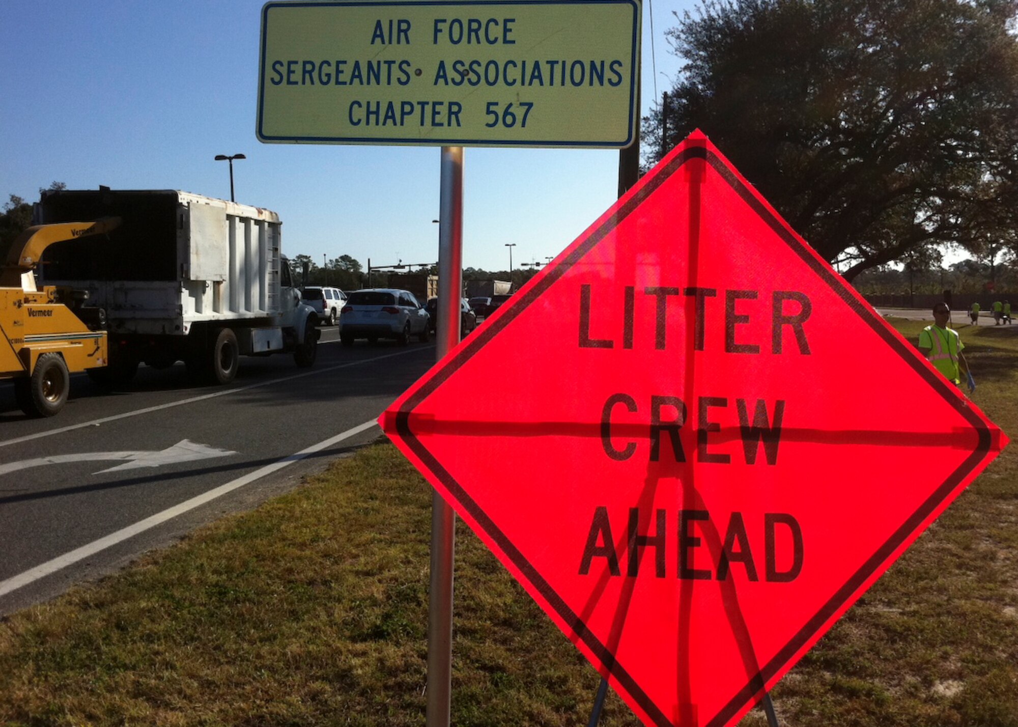 Caution signs line the road as Airmen volunteer to pick up trash on Highway 98 near Hurlburt Field, Fla., Oct. 26, 2012. Caution signs ensure the safety of volunteers as they work.(Courtesy photo)
